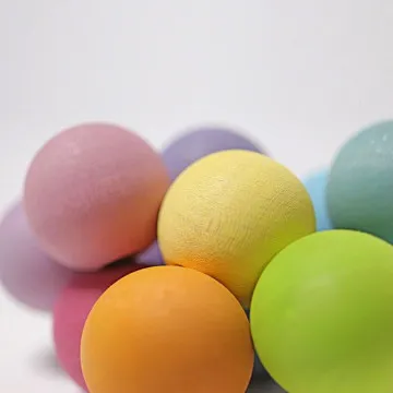 Drvena senzorička igračka GRIMM'S Pastel Grasper